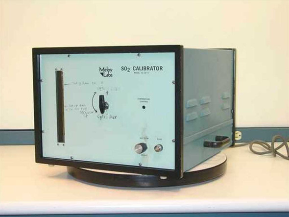 Meloy Labs CS10-2 SO2 Calibrator — front panel view showing flow meter tube, concentration control knob, air flow and flow controls, handwritten notes on panel