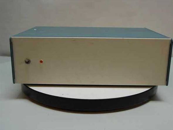 Superior Electric Modulynx DRD001 dual stepper drive controller — front panel view showing power indicator LED and toggle switch on beige and blue enclosure