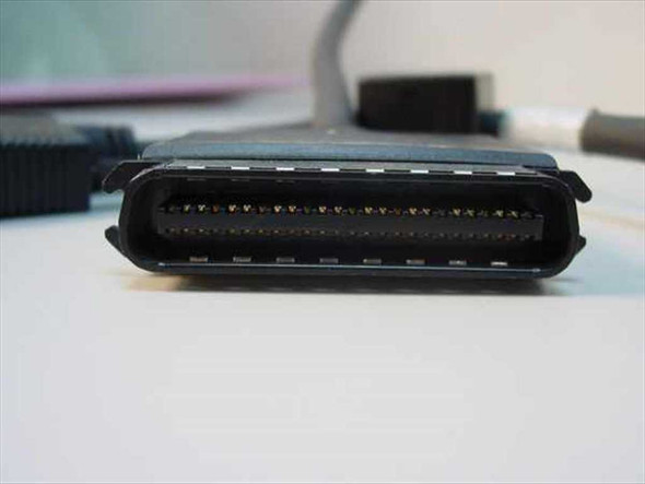 Close-up of Centronics 36-pin male connector showing gold-plated contacts in good condition