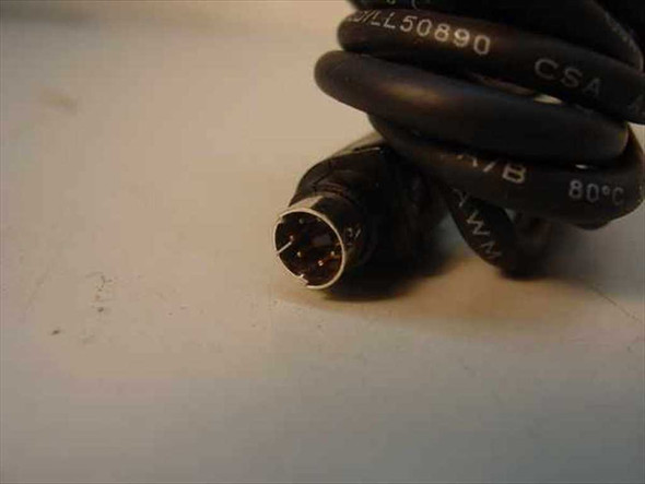 Close-up of 6-pin Mini-DIN male connector end of PS/2 extension cable with visible pin arrangement