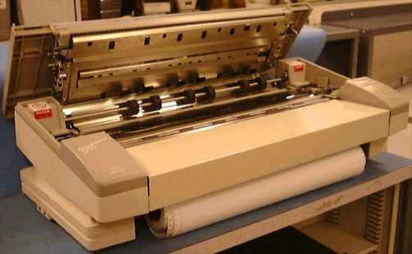 JDL 950TH Omniplotter 950 – top lid open showing pen carriage rail and multiple color ribbon pens installed