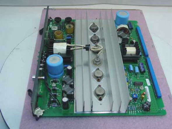 Nortel Meridian QPC691A 5/12V Power Converter Module — top-side PCB view showing large aluminum heatsink fins, power transistors, and blue electrolytic capacitors