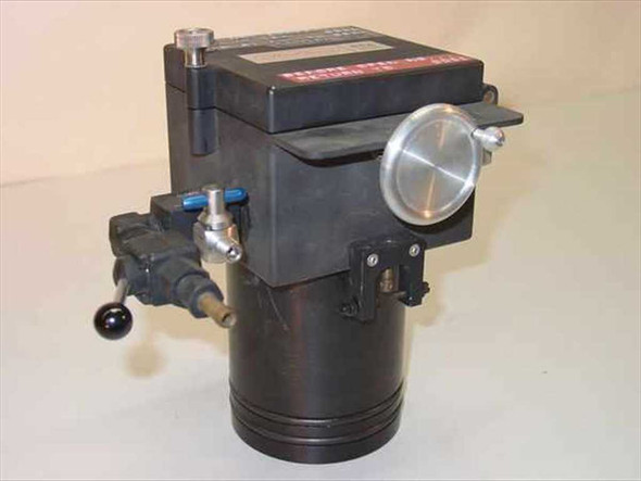 McPherson GCA film head assembly right-side view showing cylindrical lens or optical port, pneumatic valve assembly, and black anodized body