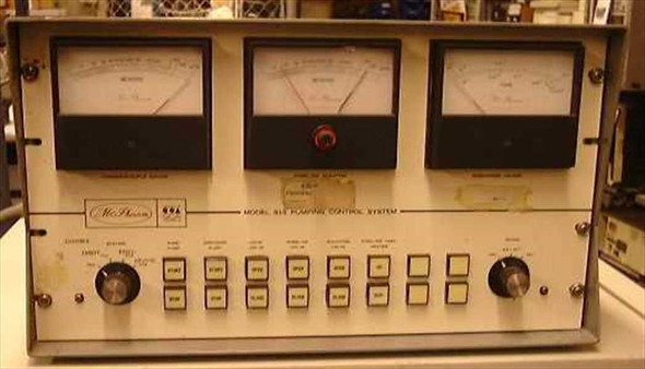 McPherson 815 Pumping Control System front panel showing three analog meters, push-button controls, and broken center gauge glass