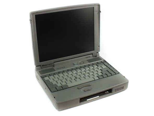 Toshiba Tecra 730XCDT laptop open front three-quarter view showing keyboard and defective LCD screen