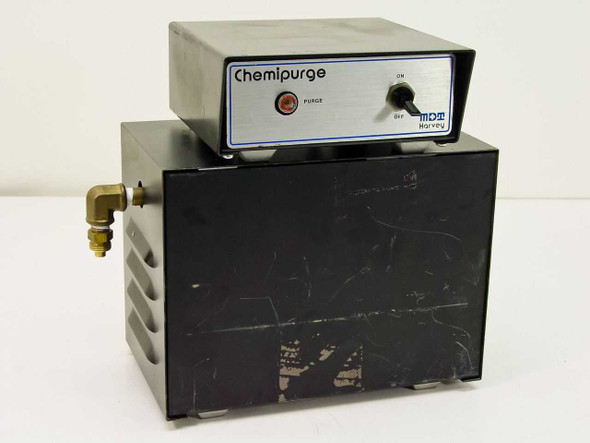 MDT Harvey Chemipurge Model 5-6 autoclave purge pump — front-left view showing Chemipurge control box atop black pump housing with brass elbow fitting
