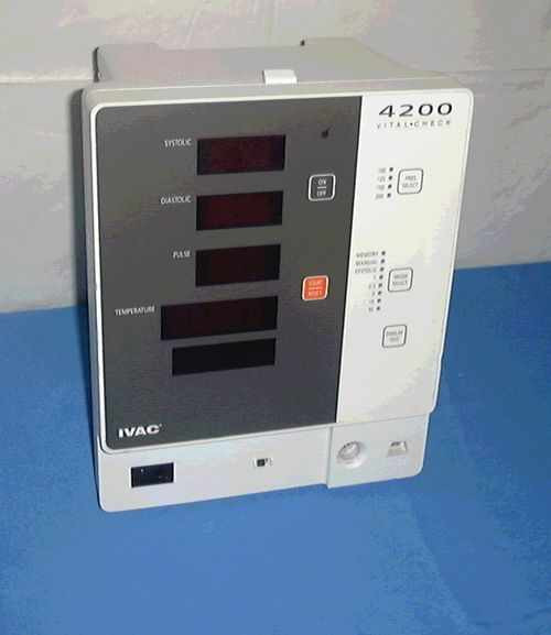 IVAC 4200 Vital Check Patient Monitor front panel showing four LED displays for systolic, diastolic, pulse, and temperature readings with control buttons