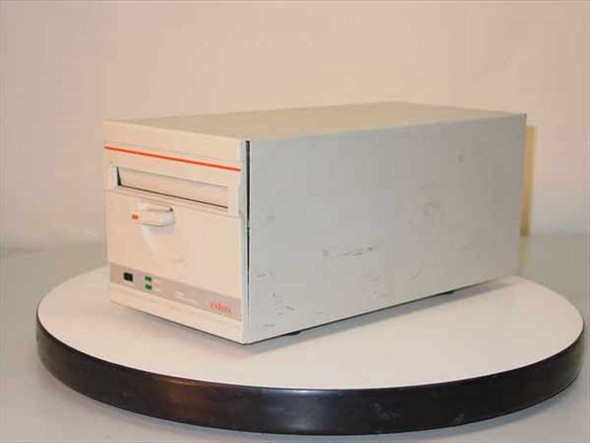Unisys M610 External WORM Optical Disc Drive – left-side three-quarter view showing beige desktop enclosure with drive slot and eject mechanism