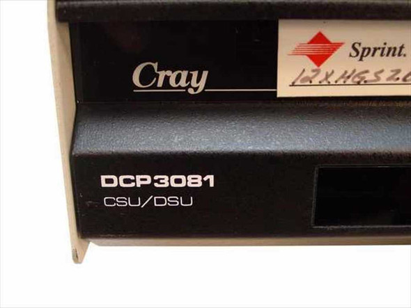 Datatel DCP3081 CSU/DSU close-up of front panel model label showing 'Cray DCP3081 CSU/DSU' with Sprint service tag sticker