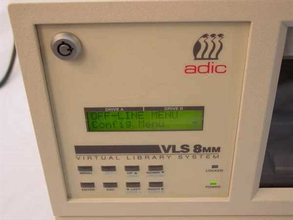 ADIC VLS-8MM front panel close-up showing LCD display with Drive A and Drive B menus, navigation buttons, and VLS 8MM Virtual Library System label