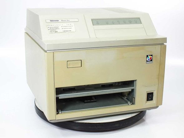 Tektronix Phaser IIsd 4684 color thermal wax transfer printer – front right three-quarter view showing paper output tray and power switch