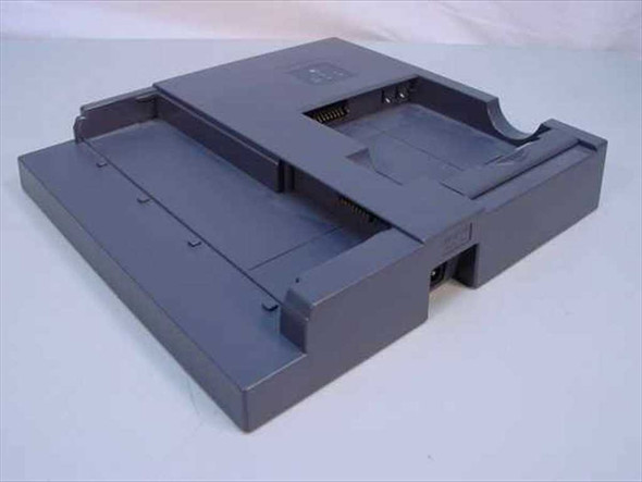 Toshiba PA3011U battery charger dock – angled top view showing battery cradle and docking connector