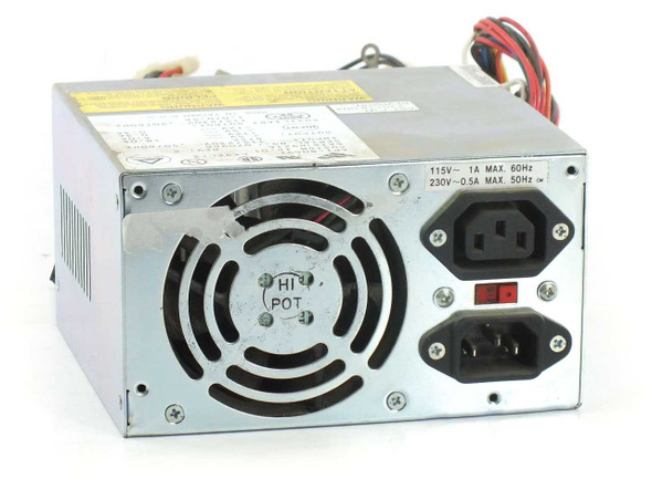 AST API-8069F 230128-004 power supply front panel showing dual IEC AC input connectors, fan grille, and voltage selector switch