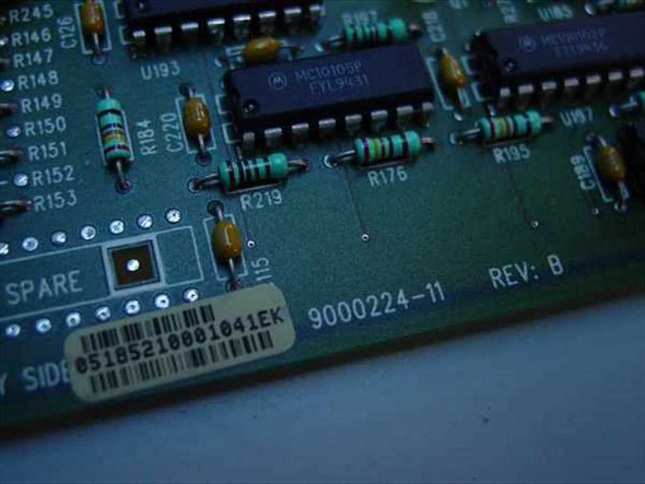 Cabletron IRBM 9000224-11 PCB close-up showing part number 9000224-11, REV: B silkscreen, barcode label, and Motorola MC10105P IC