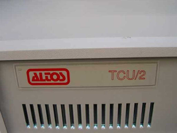 Altos TCU/2 A – close-up of front panel badge showing Altos logo and TCU/2 model designation