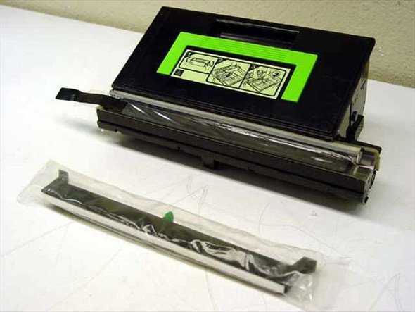 Sharp FO-48ND laser toner developer kit – top view showing cartridge with green instructional label and sealed developer strip accessory