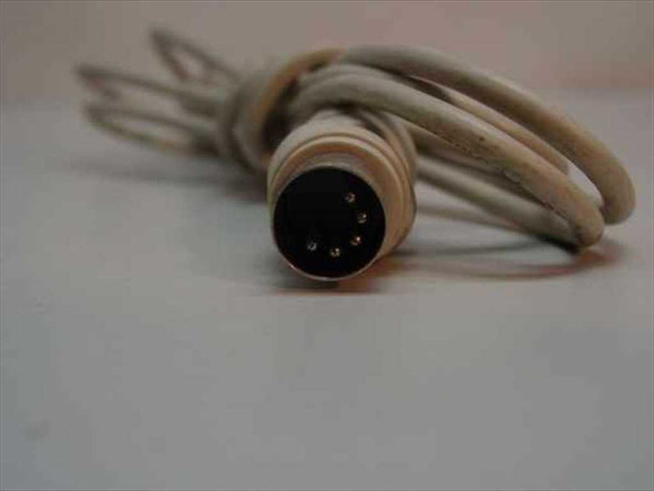 AT keyboard extension cable 5-pin DIN male connector and beige cable coiled on white surface