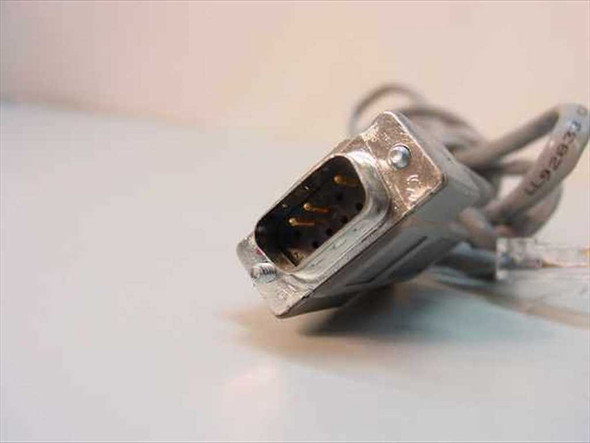 Close-up of DB9 male 9-pin connector end of RJ45 to DB9 serial console cable