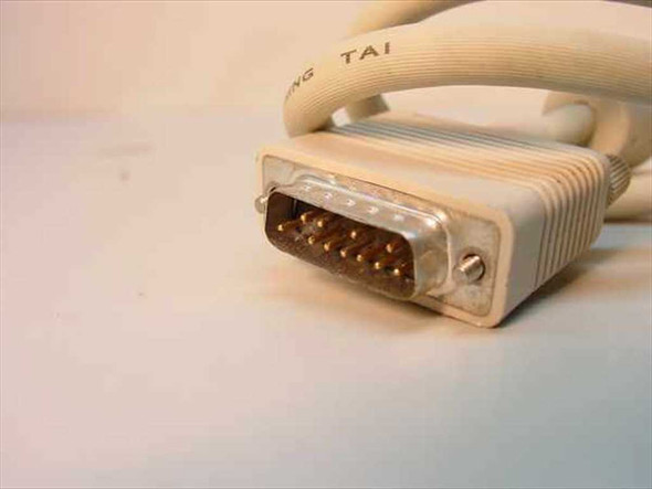 Apple monitor cable DB15 male connector end close-up showing 15 gold pins in D-Sub housing