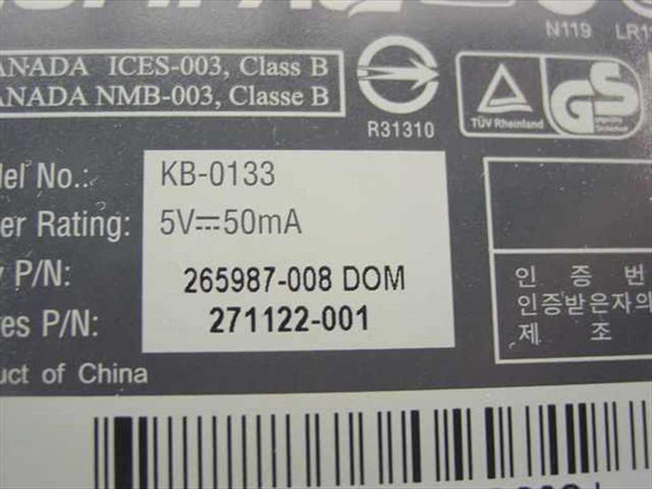 Compaq KB-0133 bottom label showing model number KB-0133, P/N 265987-008, series P/N 271122-001, and 5V 50mA power rating