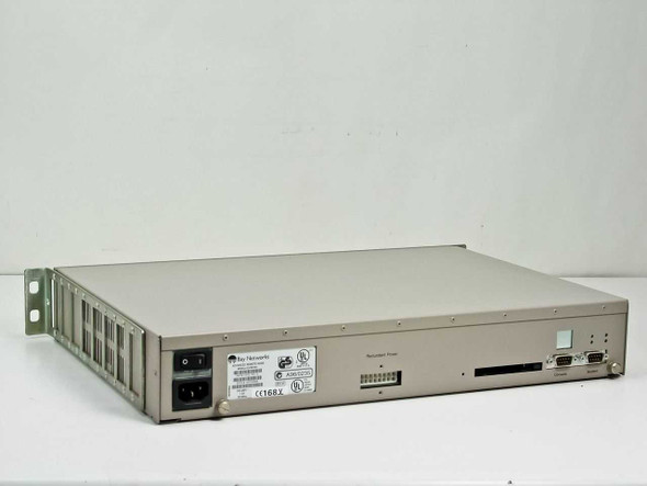 Bay Networks CV1001001 Advanced Remote Node — rear panel view showing IEC AC inlet, redundant power connector, DB-9 console and modem ports, and PCMCIA slot