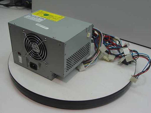 Delta Electronics DPS-350EB 352W AT power supply – right-side view showing fan grille, IEC inlet, and attached wire harness