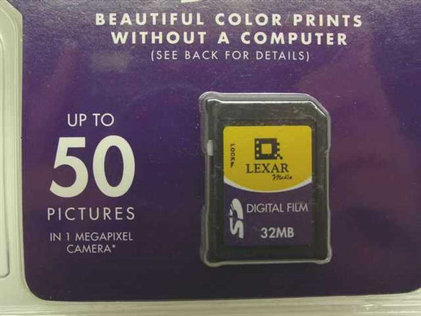 Lexar Media 32MB SD Digital Film Card close-up showing card label with SD and 32MB markings and picture capacity chart