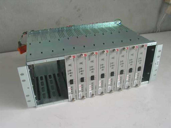 ADC Kentrox D-Serv DSU/CSU 78260 chassis – front angle view showing 8 installed single-port T1 cards with red indicator lights and 4 empty slots