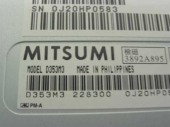 Mitsumi D353M3 label closeup showing model number, made in Philippines, sub-part number 228300, and TUV certification marks