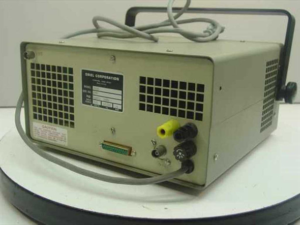 Oriel 7072 Detection System Controller — rear panel showing Oriel Corporation label plate, DB-25 connector, banana jacks, ventilation grille, and AC power cable
