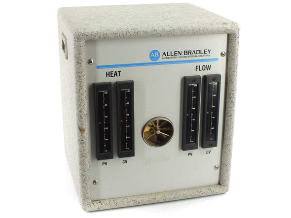 Allen-Bradley PV CV Heat and Flow Controller front panel in granite-finish enclosure showing HEAT and FLOW meter pairs with PV and CV indicators and central gold rotary switch