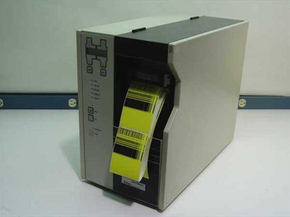 Zebra Z90GM thermal transfer barcode label printer – front left three-quarter view with yellow barcode labels loaded