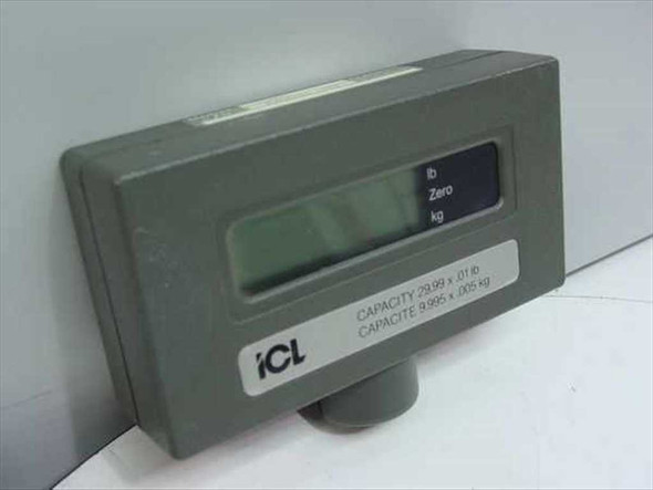ICL 310RD scale display front view showing LCD readout with lb/Zero/kg labels and capacity plate — 29.99x.01 lb / 9.995x.005 kg