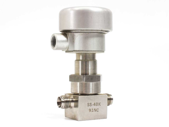 Nupro SS-4BK-91NC pneumatic actuated bellows valve — front-left angle view showing model markings SS-4BK and 91NC on valve body