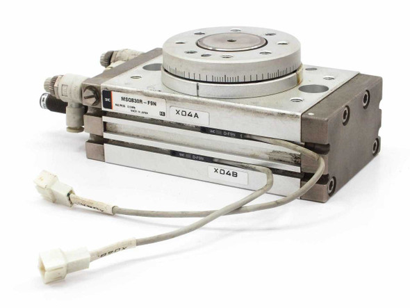 SMC MSQB30R-F9N pneumatic rotary actuator — top and front angle showing rotary table top and body label