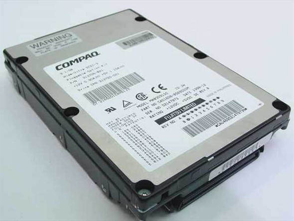 Compaq 313720-001 9.1GB Wide-Ultra SCSI-3 hard drive — top label view showing Compaq branding and part number