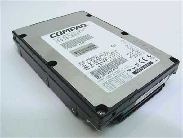 Compaq 127889-001 9.1GB Wide Ultra SCSI hard drive top label view showing Compaq branding and barcode
