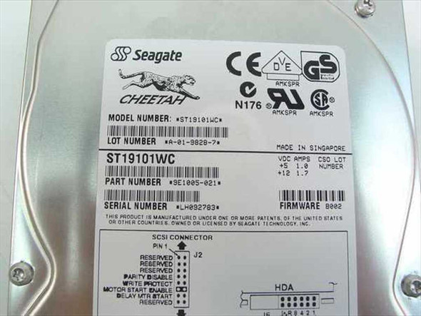 Seagate ST19101WC Cheetah bottom label showing model number, part number SE1005-021, serial number, SCSI connector jumper diagram, and Singapore manufacture marking