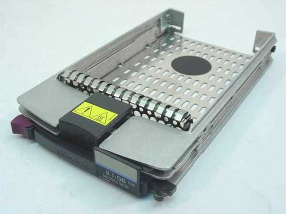 Compaq 386536-001 hot-plug Ultra2 SCSI drive tray – front and top angle view showing vented tray, drive retention arm, and 9.1GB 10K label