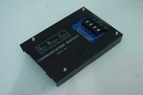 Digital Monitoring Products DMP Model 984 Communication Module – top view showing black enclosure and DMP logo plate with blue PCB visible