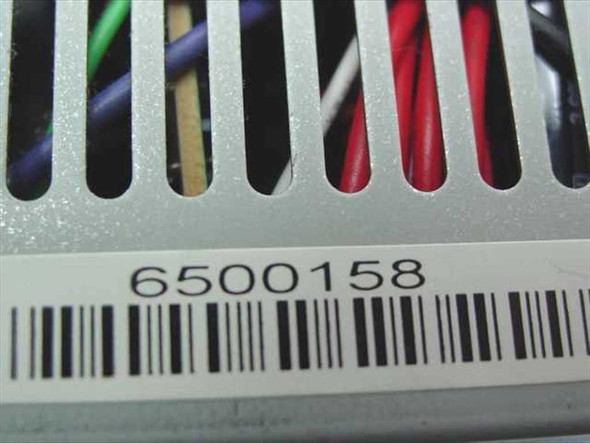 Gateway 6500158 power supply – close-up of barcode label showing part number 6500158 on the chassis side vent