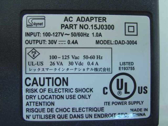 Skynet DAD-3004 rating label – shows Part No. 15J0300, Input 100-127V 1.0A, Output 30V DC 0.4A, UL Listed