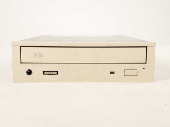 Toshiba XM-6201B 32x SCSI CD-ROM drive – front panel closeup showing headphone jack, volume slider, disc tray, and eject button