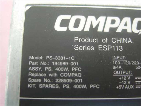 Compaq PS-3381-1C ESP113 power supply label closeup showing model number, part number 194989-001, spare number 228509-001, input/output specs, and PFC designation