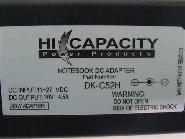 Hi Capacity DK-C52H label closeup showing Part Number, DC Input 11-27V, DC Output 20V 4.5A, 90W Adapter rating