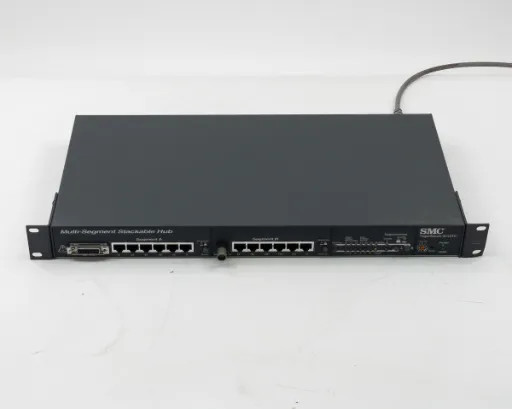 SMC TigerStack 3312TC stackable hub — front panel view showing RJ45 ports, AUI port, and right-side controls