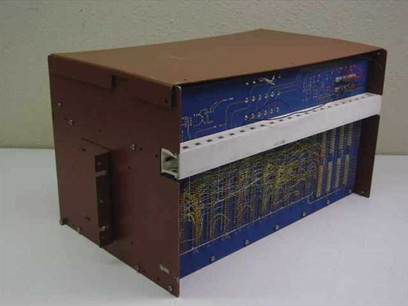 CMC Alarm-Matic System 4000 – rear/bottom view exposing wire wrap circuit board with yellow and green wiring on blue PCB