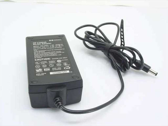 HP F1044A AC/DC Adapter label showing input/output specifications and certifications — top view