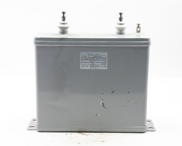 TOEI O82130 high voltage capacitor – front view showing gray steel tank body and white label with specifications