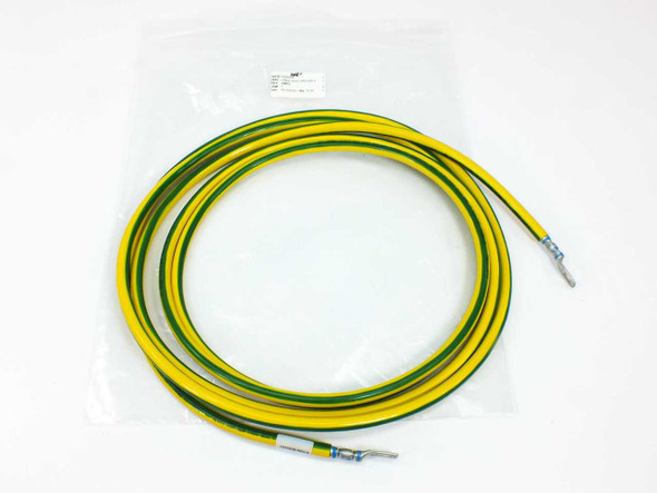 BHC 1002636A ground cable assembly coiled in original poly bag — yellow and green jacket with ring lug and pin terminals visible